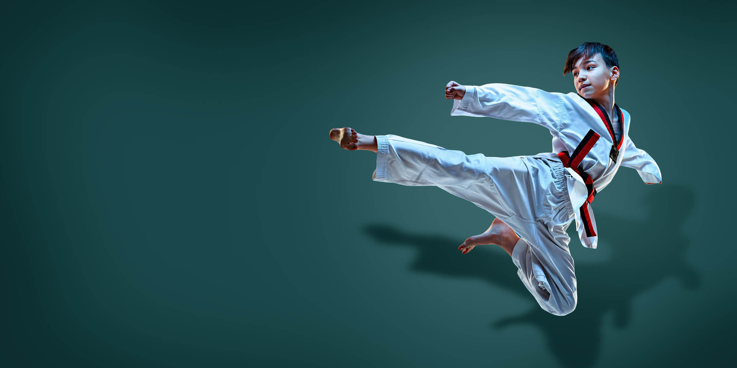 Young taekwondo athlete performing a flying kick for Star Player Iconography